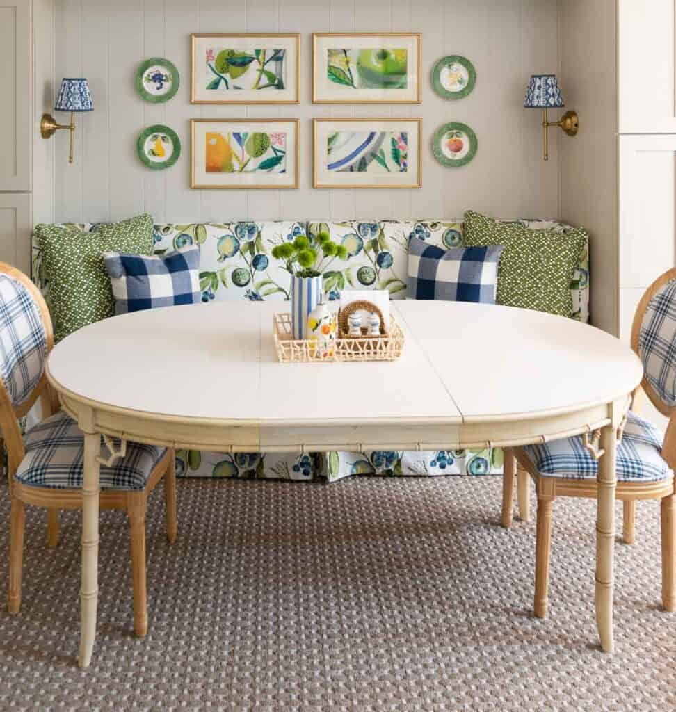 breakfast table with colorful pictures behind it