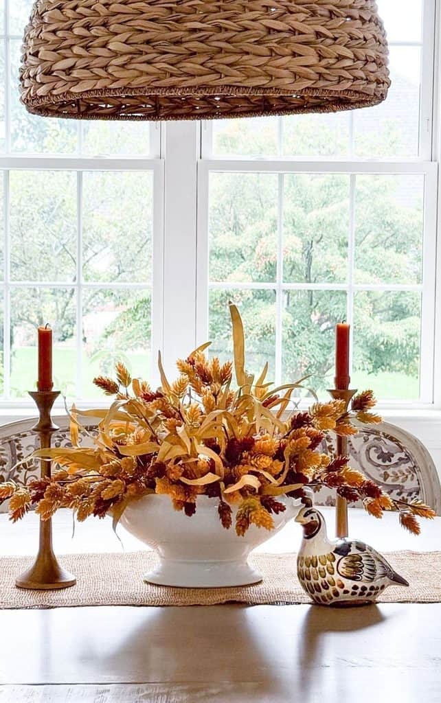 brass-and-bronze-candlesticks on the dining room table