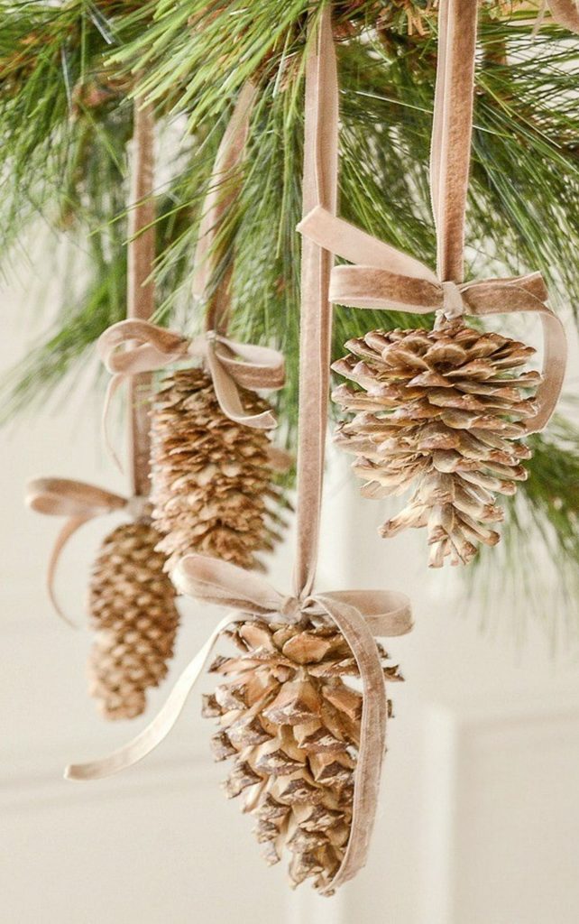 pinecone hanging on thin velvet ribbon